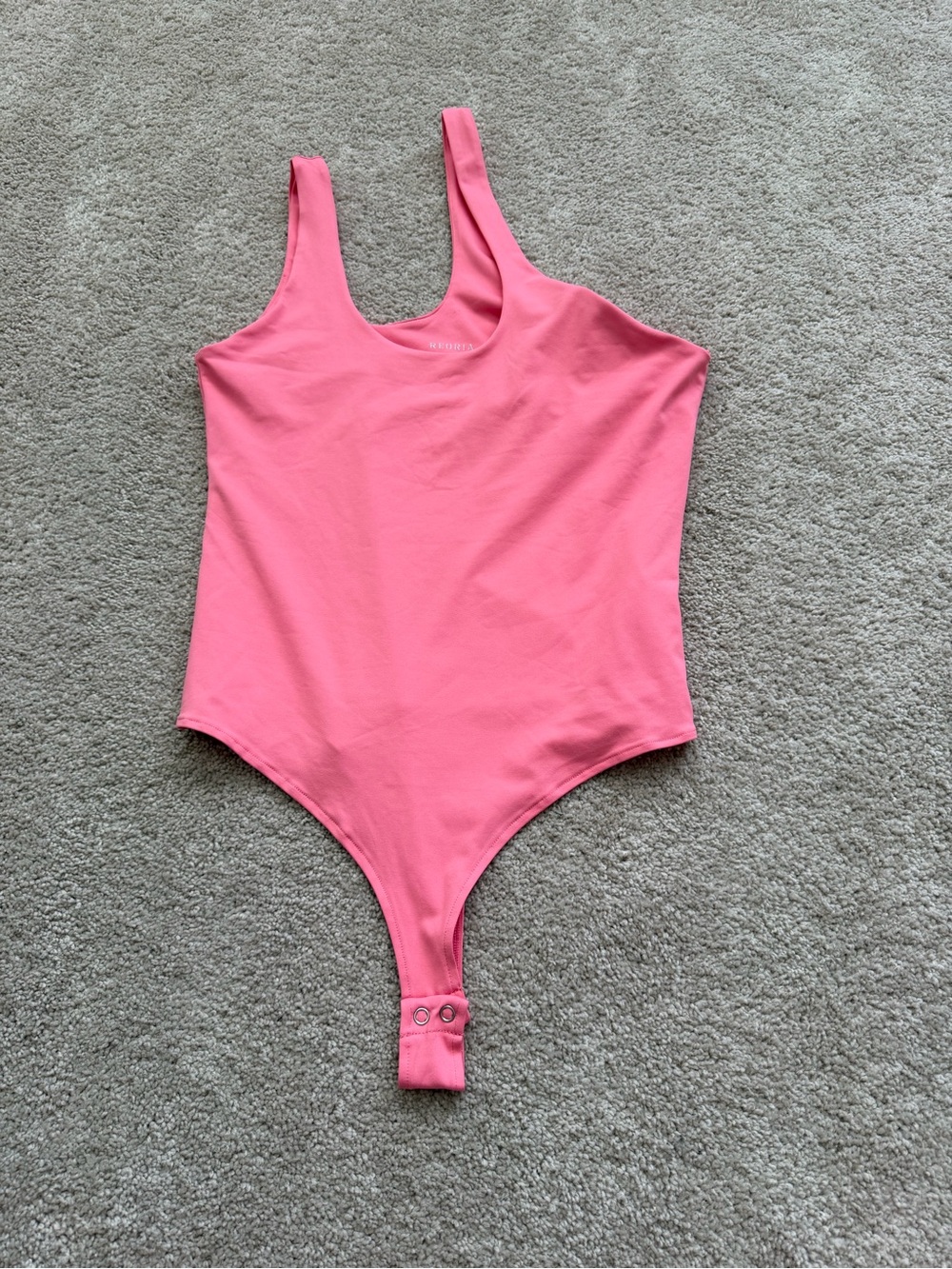 REORIA pink thong bodysuit, popular for its seamless, double-lined stretchy L